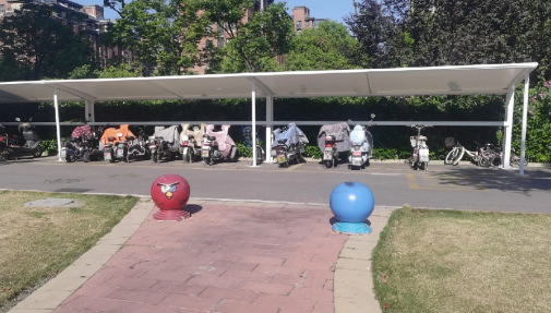 小区电动车充电棚离楼宇距离多远 小区电动车充电棚离楼宇距离多远