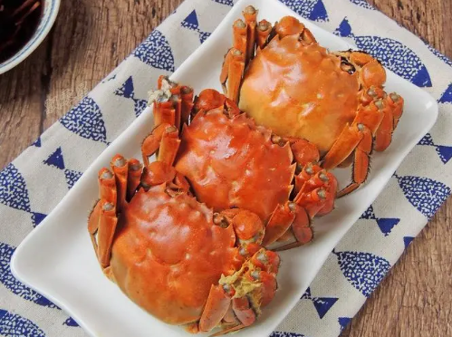 螃蟹和橙子同吃等于砒霜吗（螃蟹和橙子一起吃会中毒吗）