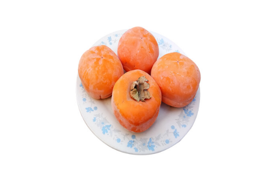 冻柿子在冰箱里冻了一年还能吃吗（柿子在冰柜里冷冻一年可以吃吗）